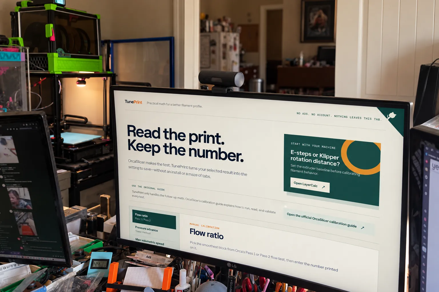 The workshop bench, with TunePrint on the main monitor beside the printers.